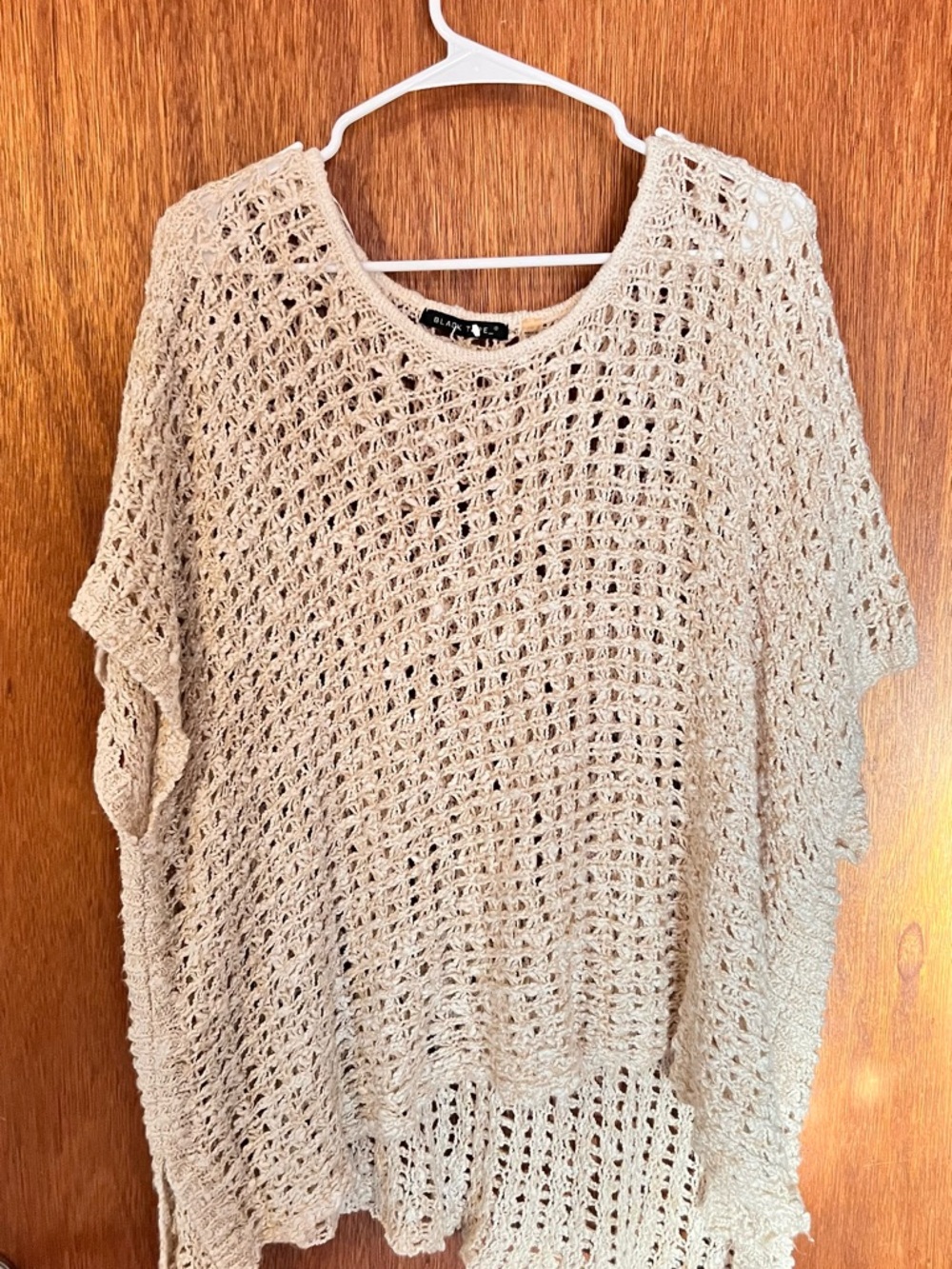 Black Tape_ Open-Weave Crochet Poncho Sweater in Beige